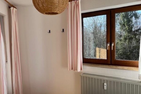 Schlafzimmer mit Balkonzugang